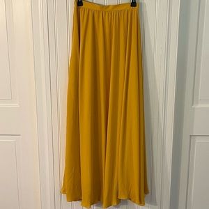 Long yellow flowy skirt